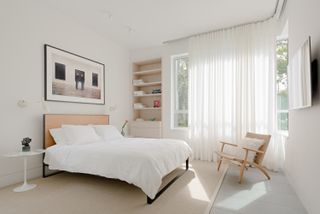 A white and beige minimalist bedroom