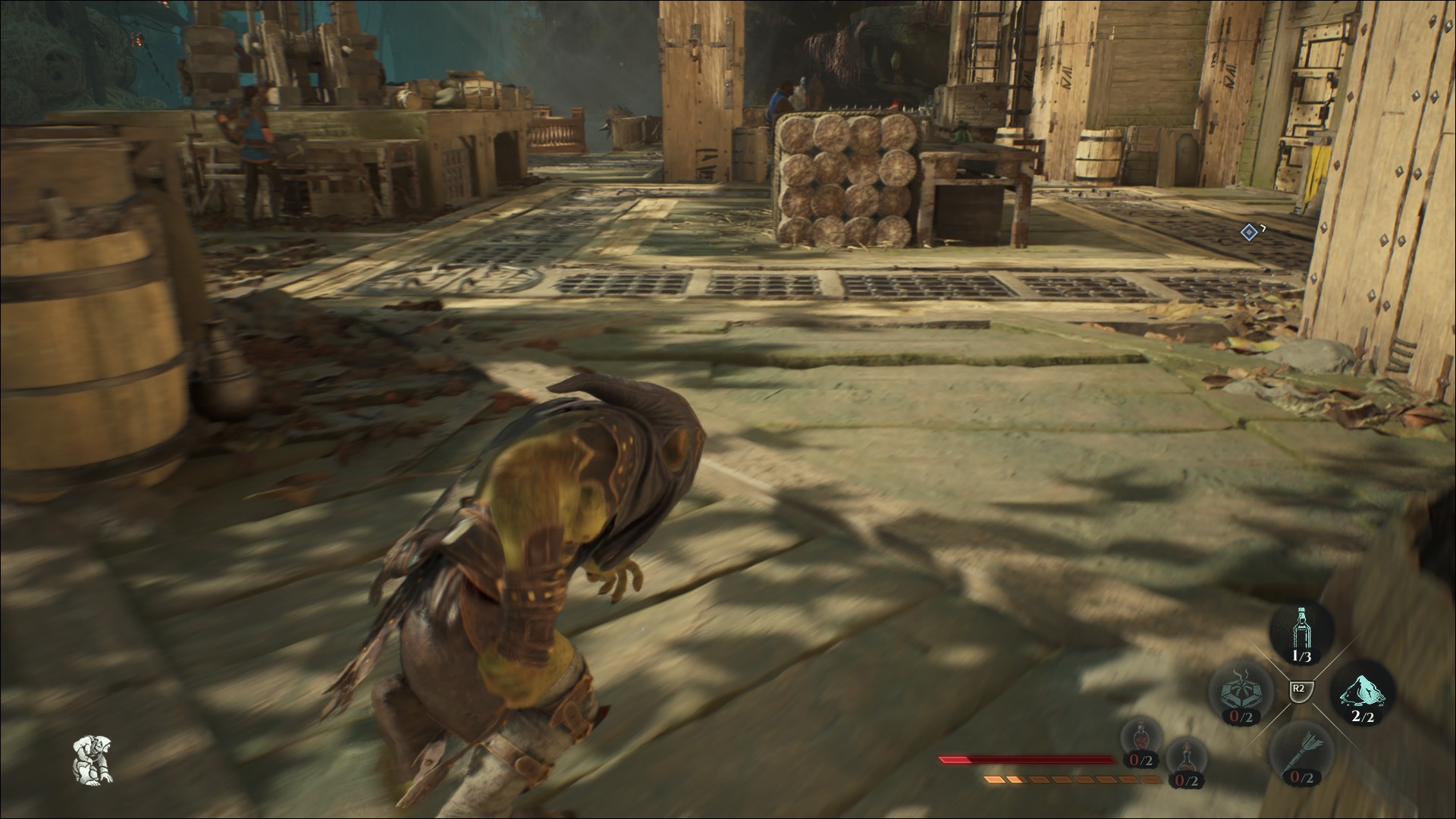 A Styx: Blades of Greed screenshot showing Styx sneaking around outside some wooden fortifications.