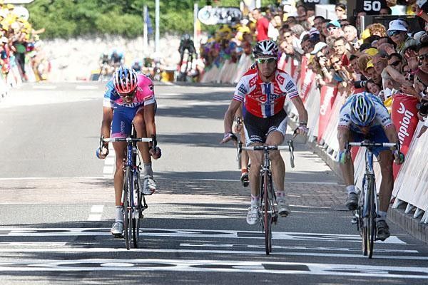 The sprint for stage 11 was decided by the camera with all three riders within centimetres of each other.