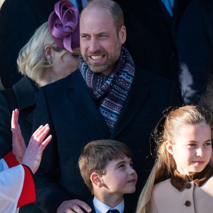 Prince Louis wears a navy suit on Christmas Day in Sandringham as he appears alongside dad Prince William and sister Princess Charlotte