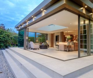 modern glass box extension with sliding doors