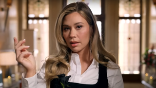 Gabby Windey posing in The Traitors Season 3 trailer