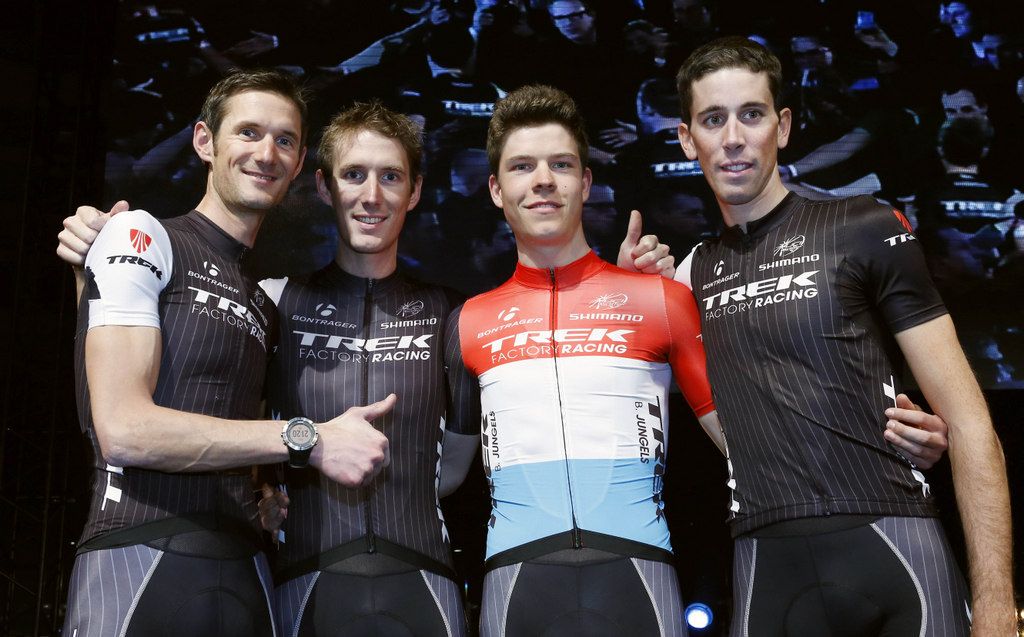 Bob Jungels in the Luxembourg tricolour with compatriots Fr&auml;nk and Andy Schleck, and Laurent Didier at the Trek team presentation in 2014