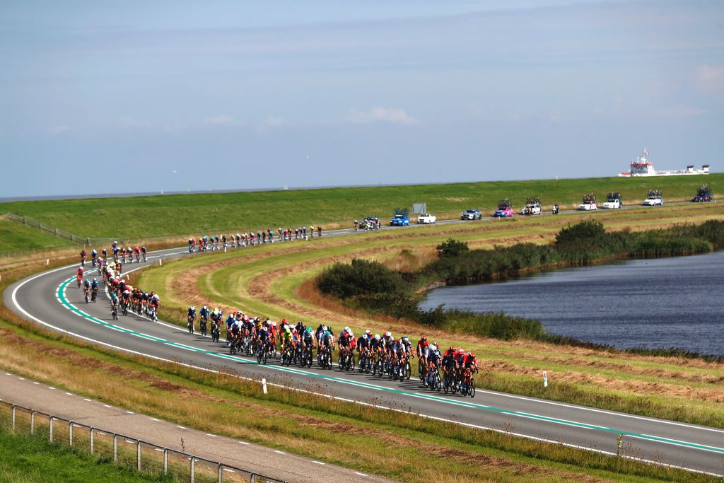 DOKKUM NETHERLANDS AUGUST 30 A general view of the peloton compete during the 17th Benelux Tour 2021 Stage 1 a 1696km stage from Surhuisterveen to Dokkum BeneluxTour on August 30 2021 in Dokkum Netherlands Photo by Bas CzerwinskiGetty Images