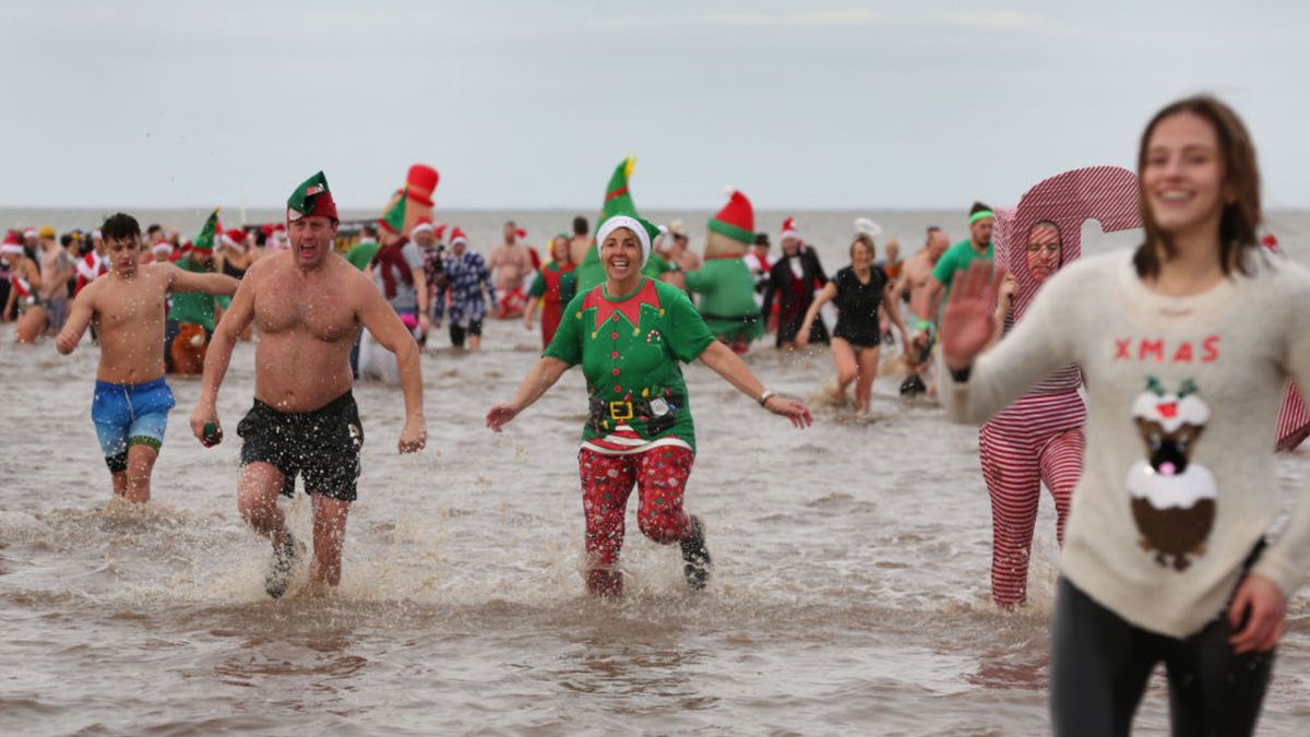 Swimmers in fancy dress on Christmas Day