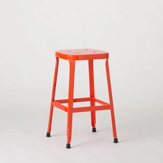 A red bar stool suitable for the backyard