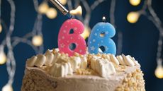 Birthday cake with 66 number candle © Getty Images/iStockphoto