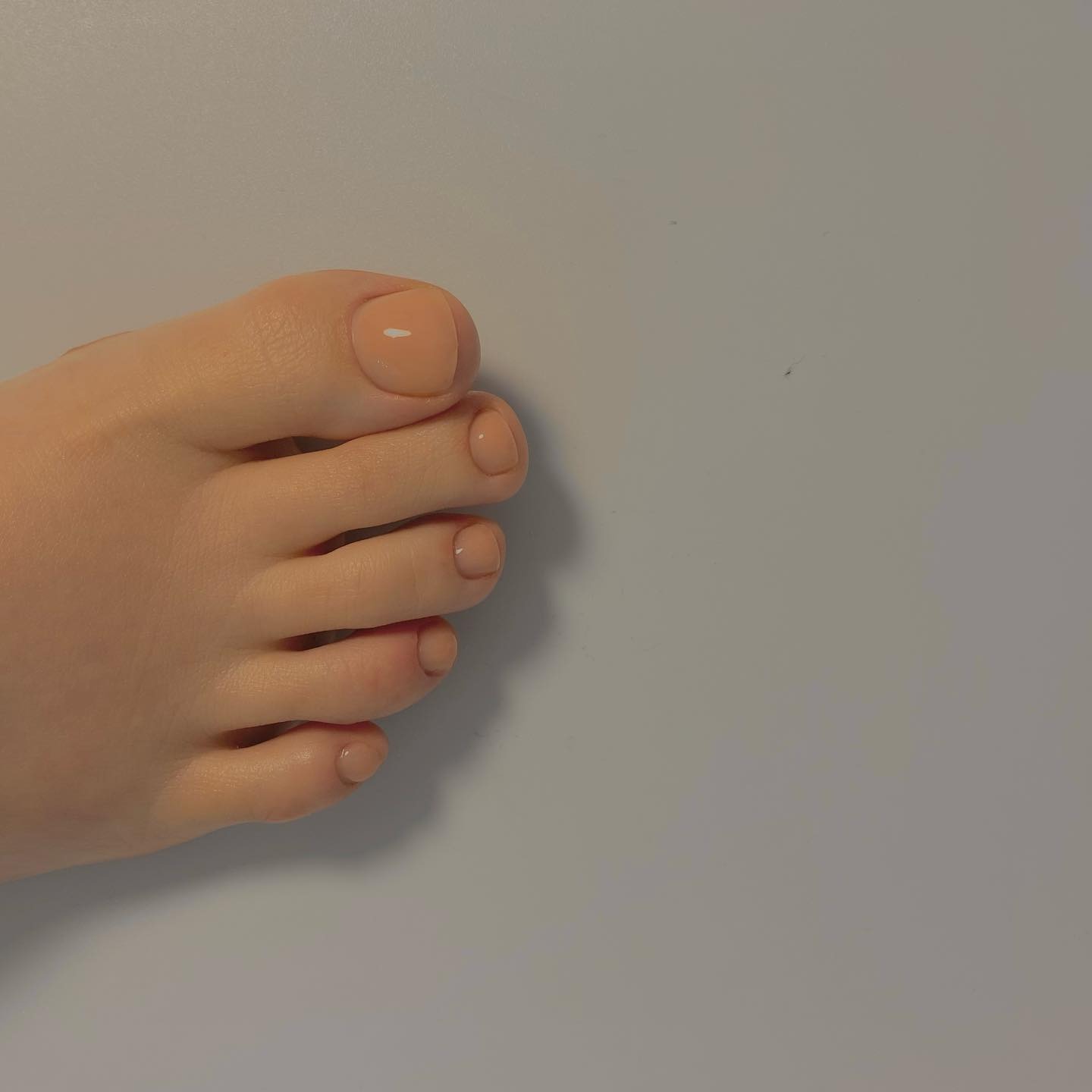 Photo of a soft peach pedicure