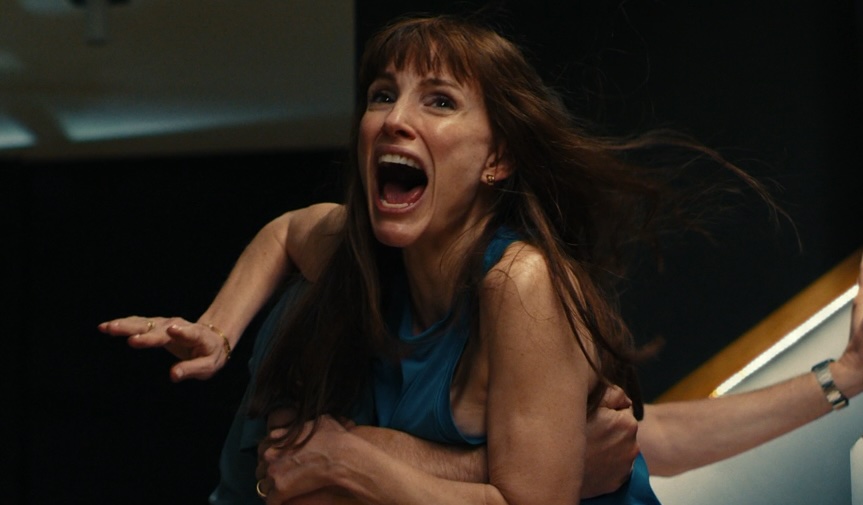 Jessica Chastain screaming while someone holds onto her in Other Mommy