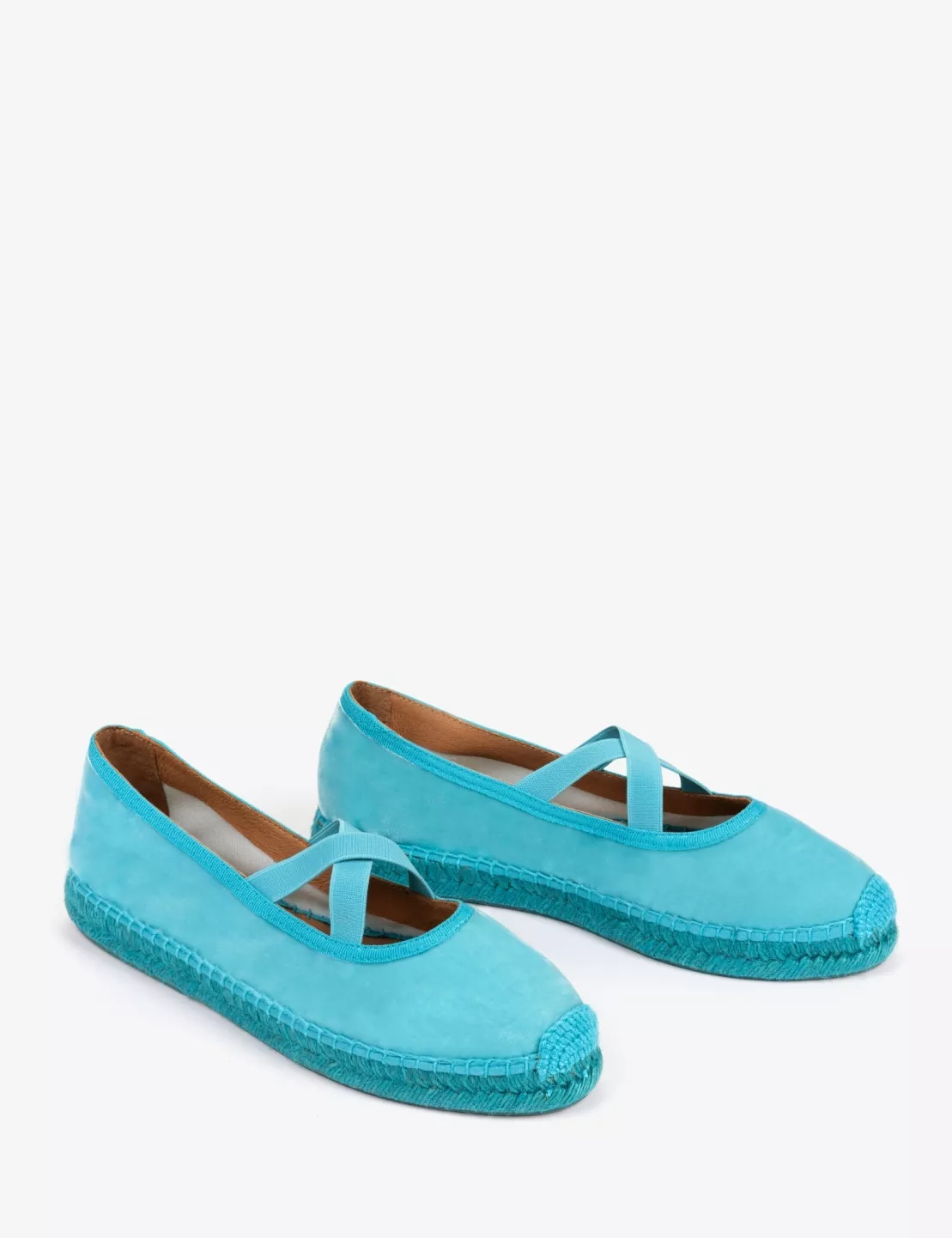 A pair of turquoise Penelope Chilvers espadrilles