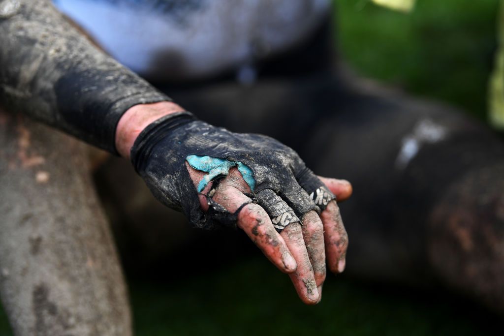 ROUBAIX FRANCE OCTOBER 03 Detailed view of broken glove of Max Walscheid of Germany Team Qhubeka Nexthash covered with mud after the 118th ParisRoubaix 2021 Mens Eilte a 2577km race from Compigne to Roubaix ParisRoubaix on October 03 2021 in Roubaix France Photo by Tim de WaeleGetty Images