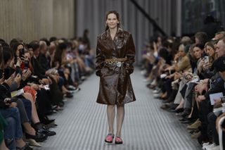 Hilary Swank walking for Miu Miu