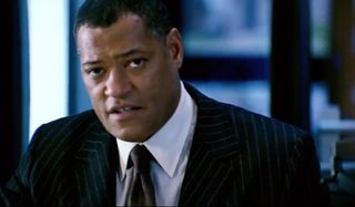 Laurence Fishburne addresses the room in Mission: Impossible III.