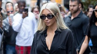Kim Kardashian wearing sunglasses.