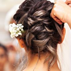 a woman on her wedding day - wedding hair trends