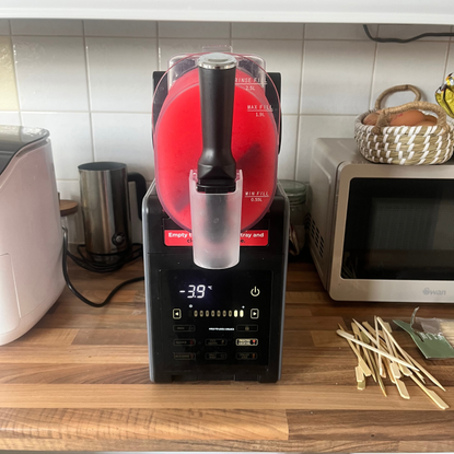 Salter Slushie Machine on Kicthen worktop making raspberry slush.