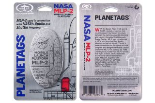 MotoArt’s NASA MLP-2 PlaneTag comes attached by magnet to a metal descriptive backer card for display or storage.