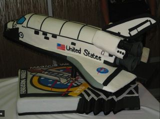 Cake shaped like space shuttle Atlantis