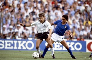 Italy's Claudio Gentile challenges West Germany's Pierre Littbarski during the 1982 World Cup final.