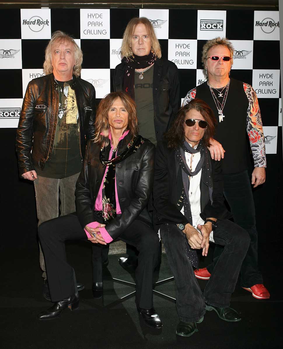 Aerosmith pose at a photocall at the Hard Rock Cafe