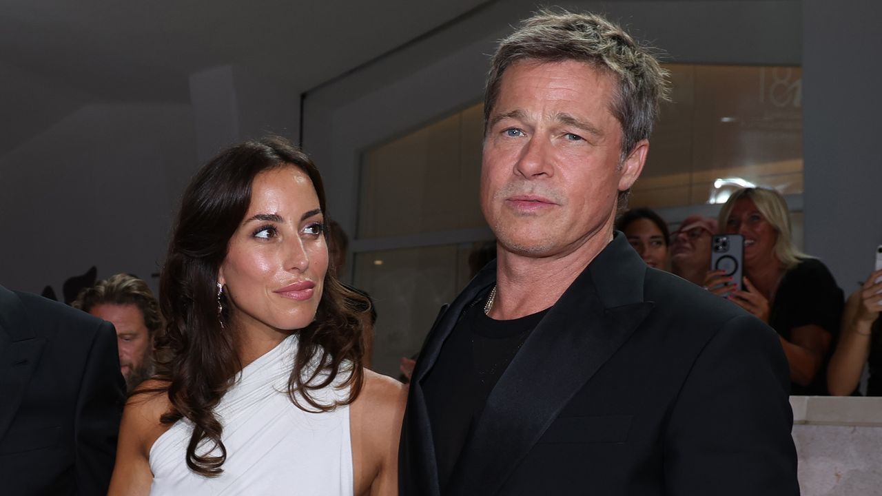 Ines de Ramon and Brad Pitt attend the &quot;Wolfs&quot; red carpet during the 81st Venice International Film Festival on September 01, 2024 in Venice, Italy. 