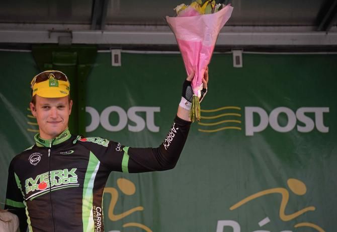 Dunne salutes the crowd at the Ras