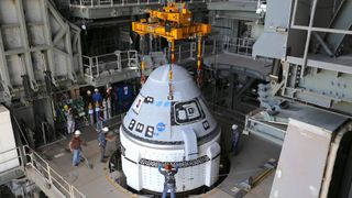 A Boeing Starliner is stacked atop its Atlas V rocket ahead of its first astronaut flight for NASA at Cape Canaveral Space Force Station in Florida.