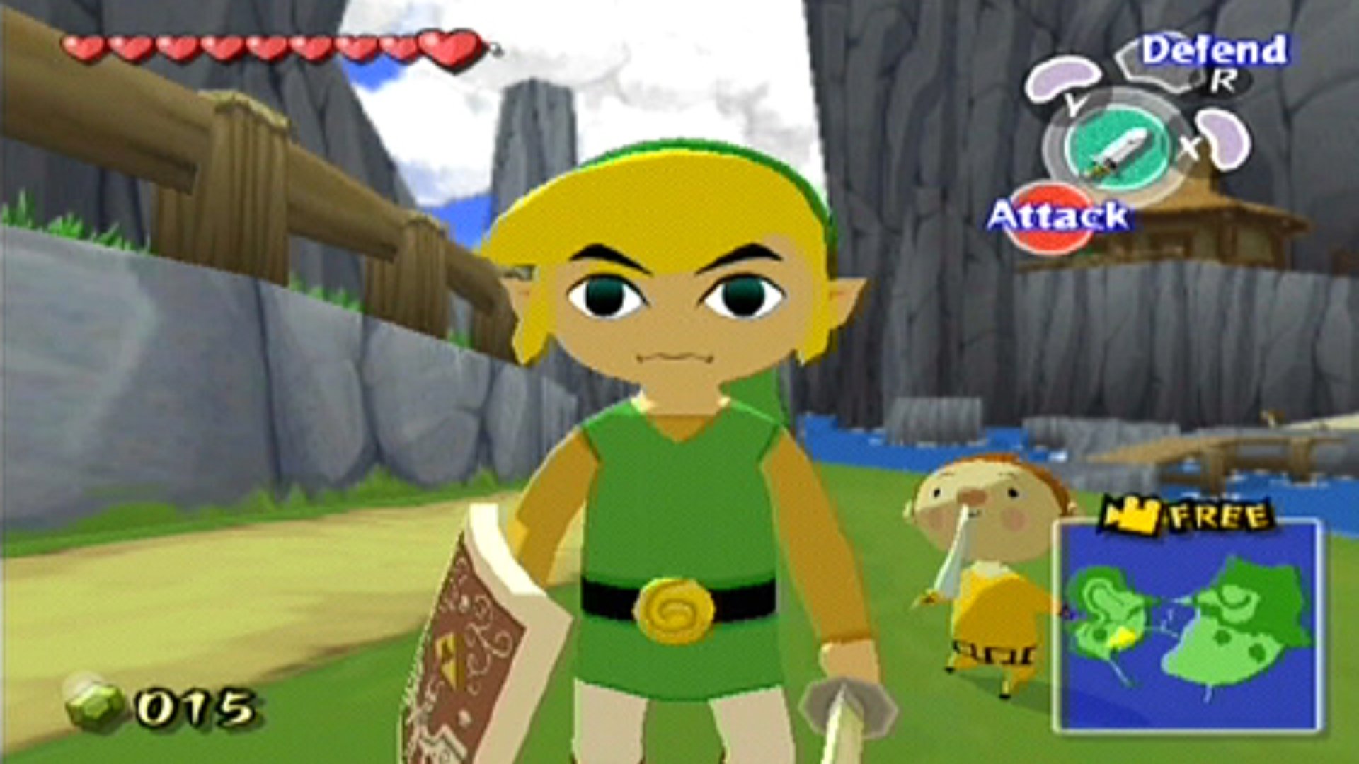 The Legend of Zelda: Wind Waker screenshot on GameCube showing Link facing the camera with his sword and shield, and a small child can be seen just behind him