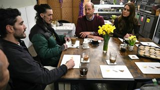 Catherine, Princess of Wales and Prince William, Prince of Wales talk with people about the recent flooding in Wales, during a visit to Pontypridd Market on February 26, 2025