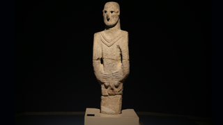 limestone statue of a man