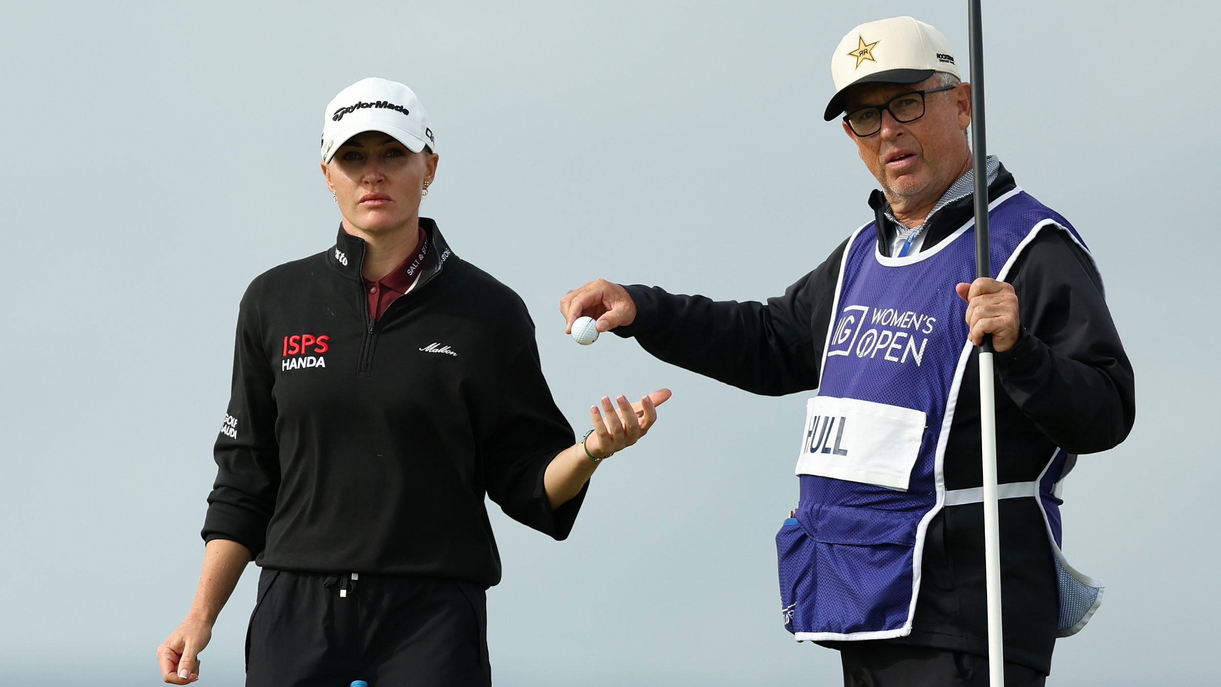 Charley Hull and her caddie