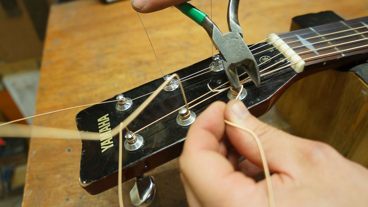 How to restring an acoustic guitar stepbystep guidance from a professional guitar repairer