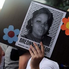 a demonstrator holds a sign with the image of breonna taylor, a black woman who was fatally shot by louisville metro police department officers, during a protest against the death george floyd in minneapolis, in denver, colorado on june 3, 2020 us protesters welcomed new charges brought wednesday against minneapolis officers in the killing of african american man george floyd but thousands still marched in cities across the country for a ninth straight night, chanting against racism and police brutality photo by jason connolly afp photo by jason connollyafp via getty images