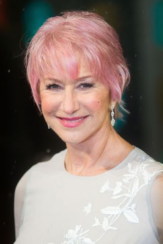 Helen Mirren is pictured with a pastel pink pixie cut at the the EE British Academy Film Awards at The Royal Opera House on February 10, 2013 in London, England.