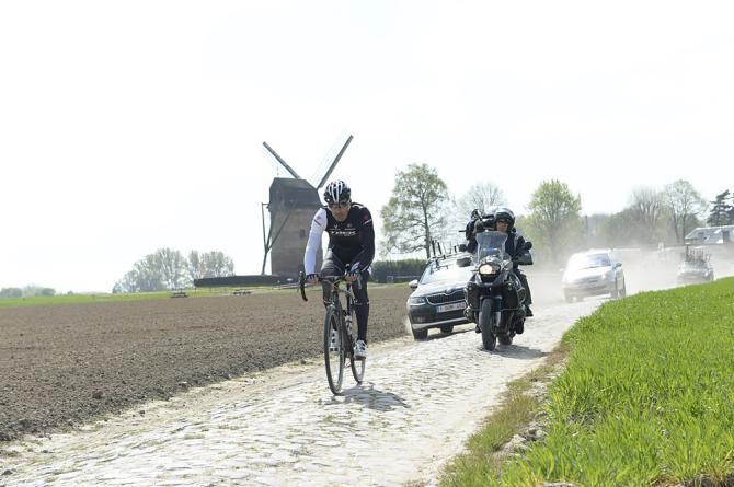 The Moulin de Vertain and its famous windmill behind Fabian Cancellara