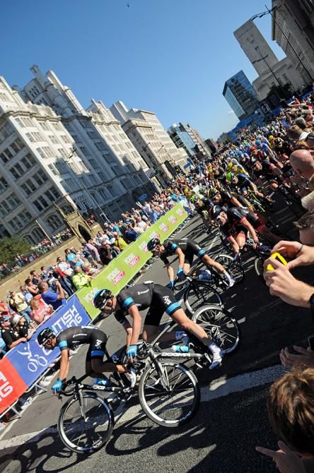 Team Sky lead into the bend in Liverpool