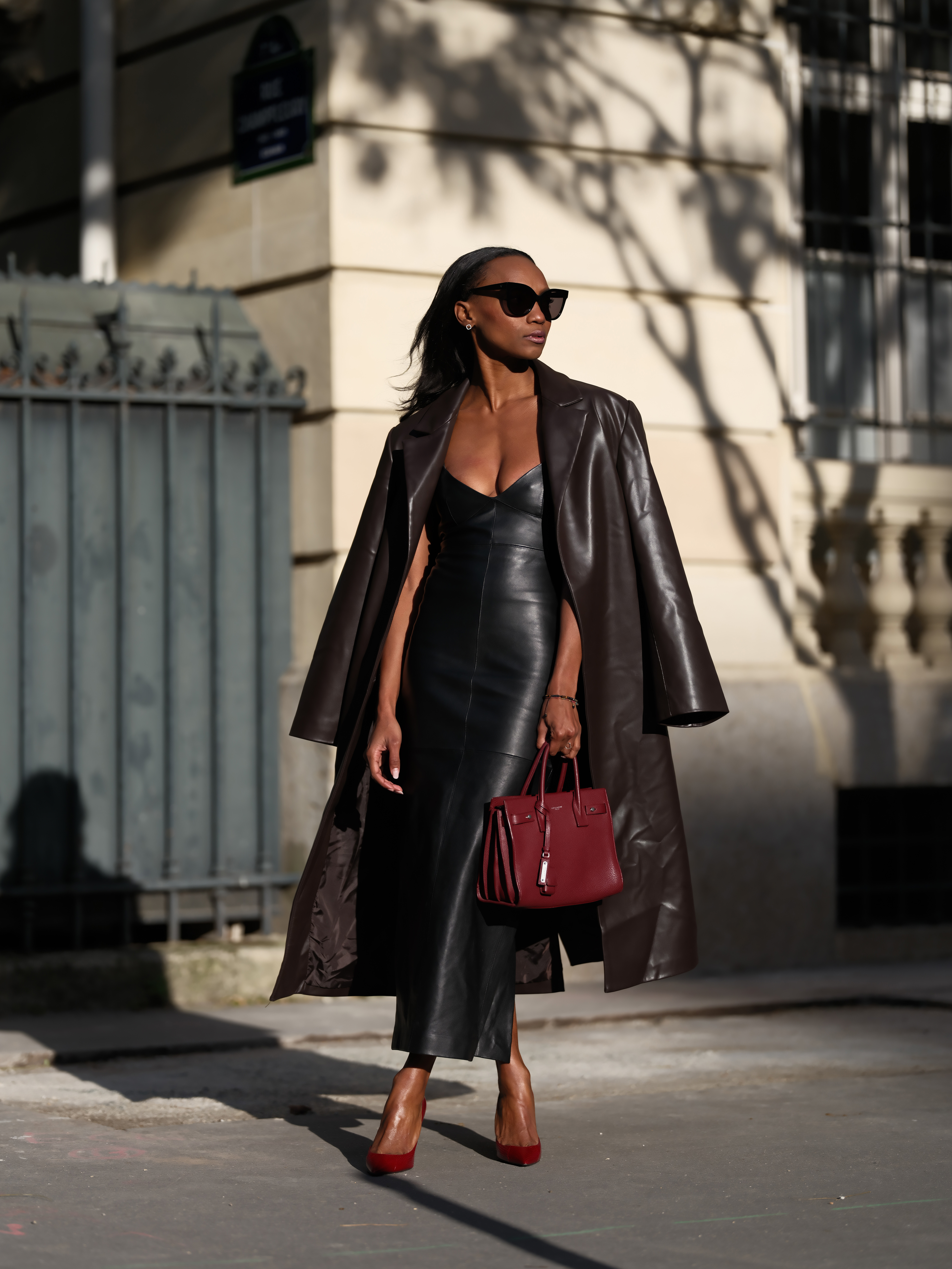 Woman wearing Saint Laurent bag.