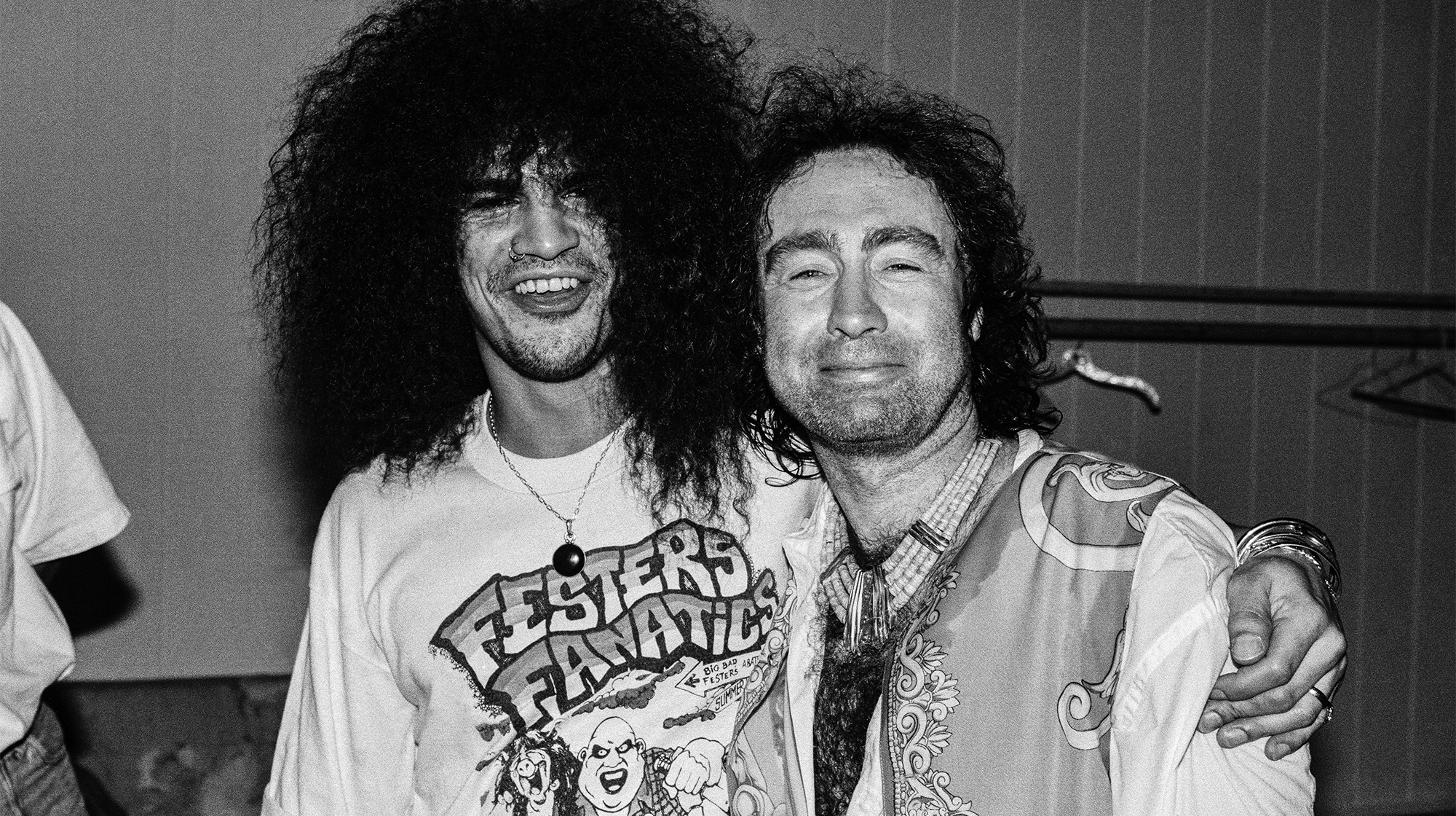 (L-R) English musicians Slash, of Guns N&#039; Roses, and Paul Rodgers, of Bad Company, pose for a portrait at an event in Los Angeles, California, circa 1990.
