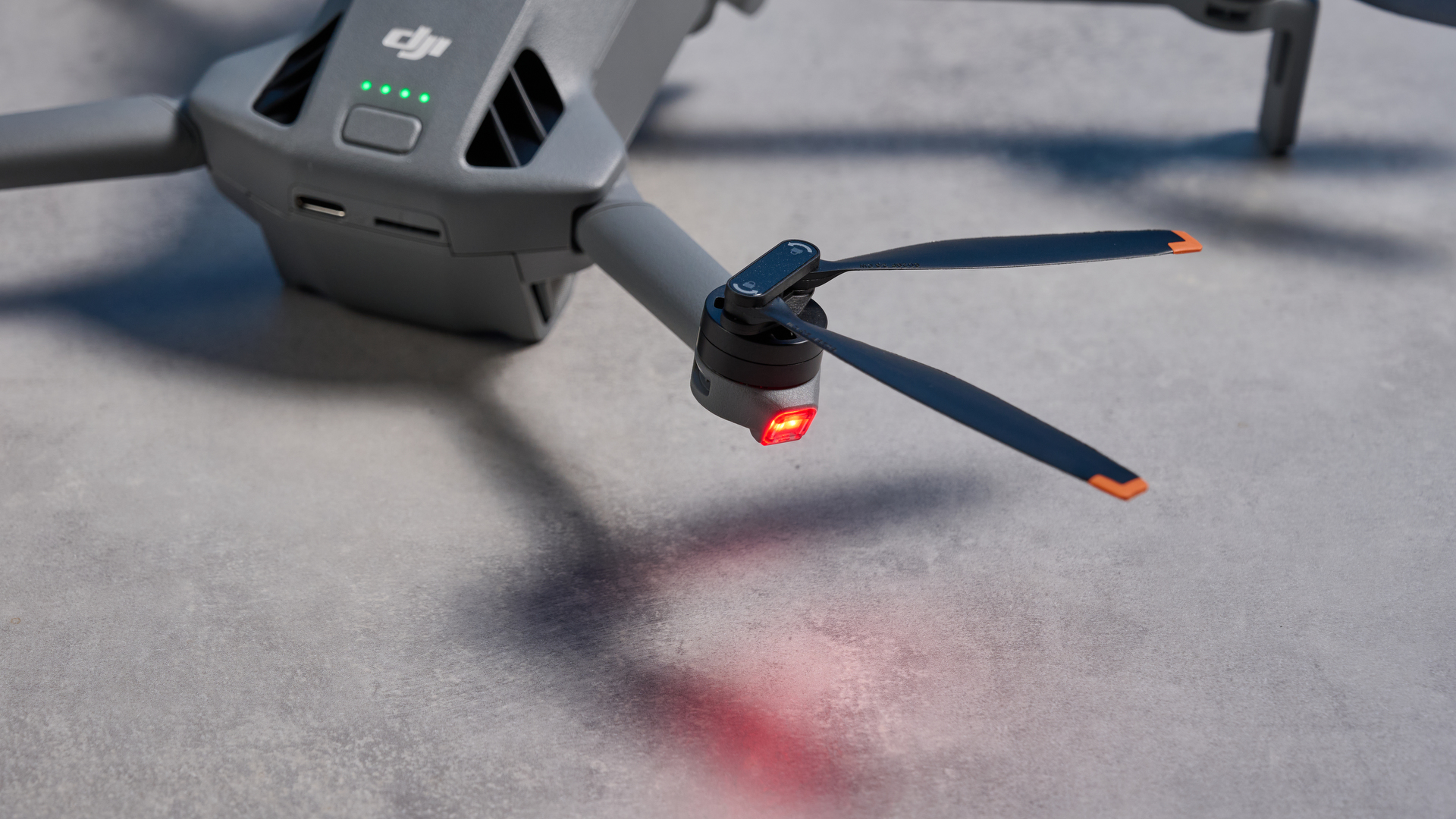 A dark grey DJI Mini 5 Pro drone
