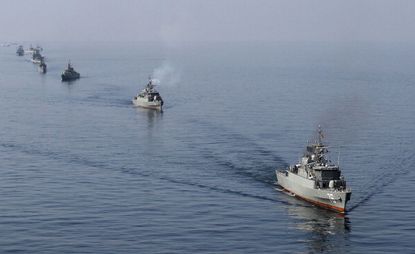 Iranian Navy ships in the Strait of Hormuz.