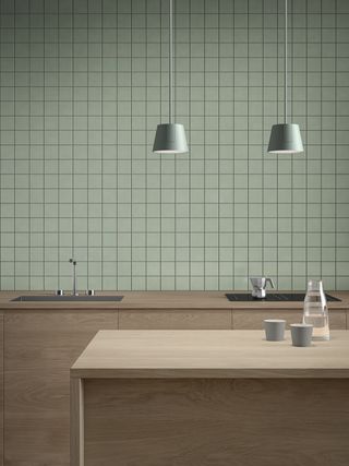 modern kitchen with green wall and green pendant lights