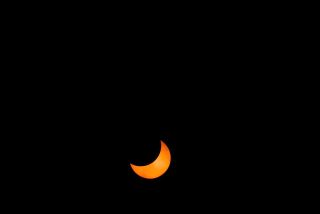 Astronomer Jay Pasachoff of Williams College took this photo of the first solar eclipse of 2014 at its near-maximum, with about 65 percent of the sun blocked by the moon, on April 29, 2014.