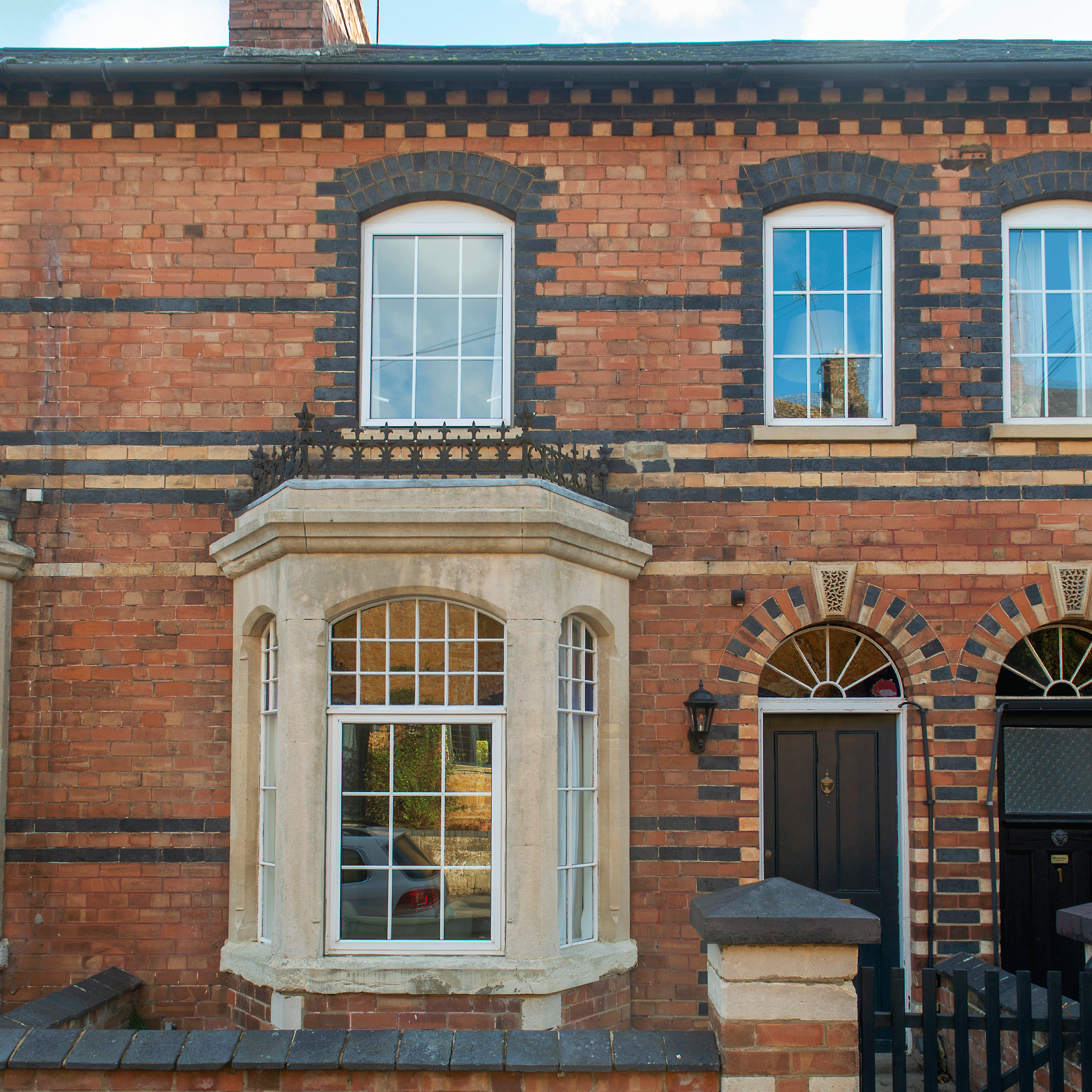 the exterior of a house with colourful brickwork