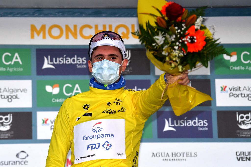 MONCHIQUE PORTUGAL FEBRUARY 17 David Gaudu of France and Team Groupama FDJ celebrates at podium as Yellow Leader Jersey winner after he 48th Volta Ao Algarve 2022 Stage 2 a 1824km stage from Albufeira to Alto Da Foia Monchique 890m VAlgarve2022 on February 17 2022 in Monchique Portugal Photo by Luc ClaessenGetty Images