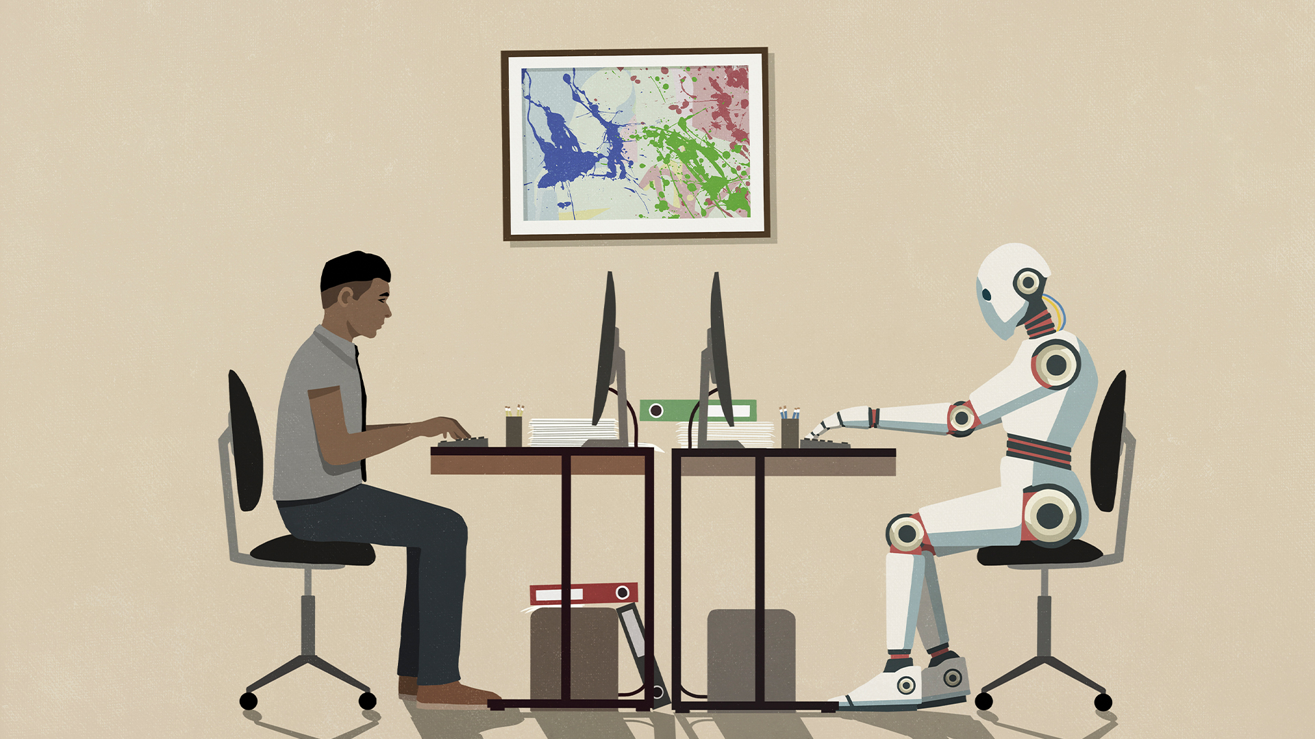 Human male office worker sitting at a desk working on computer while AI robot works on computer on other side of desk.