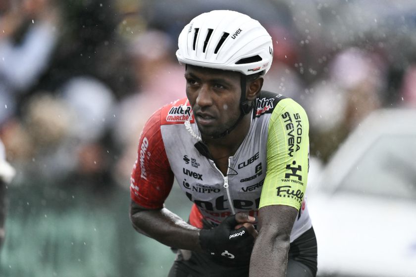 Intermarche - Wanty team&#039;s Eritrean rider Biniam Girmay crosses the finish line nursing injuries after a mass crash in the final metres of the 17th stage of the 112th edition of the Tour de France cycling race, 160.4 km between Bollene and Valence, southern France, on July 23, 2025. (Photo by Marco BERTORELLO / AFP)
