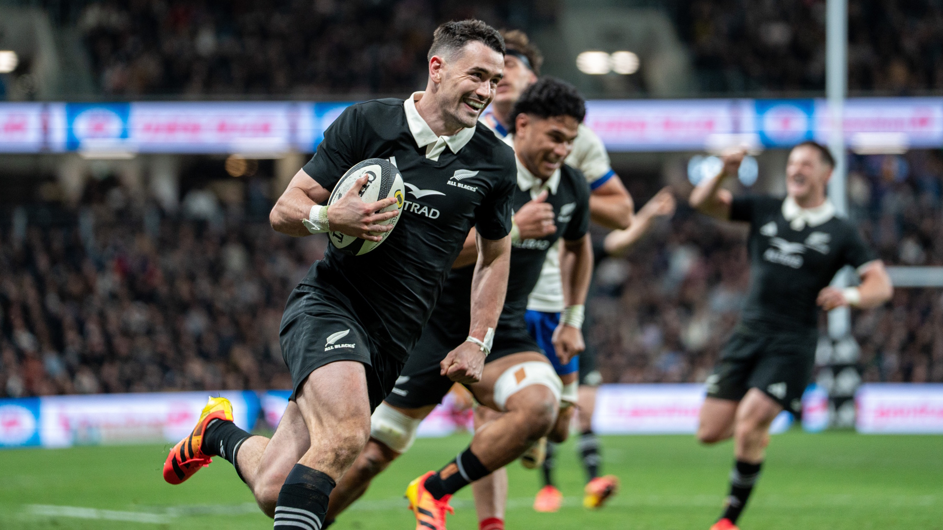Will Jordan smiles as he runs through for a try for the All Blacks of New Zealand in the 2026 Nations Championship.