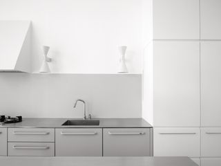 minimalist white kitchen interior by roz barr