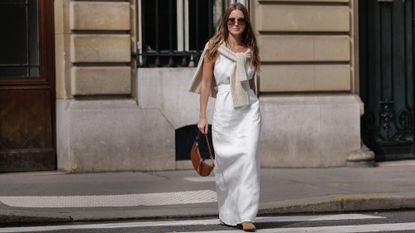 Street style attendee wearing a linen dress