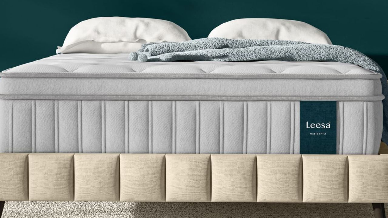 Leesa Oasis Chill Mattress against a dark blue background.